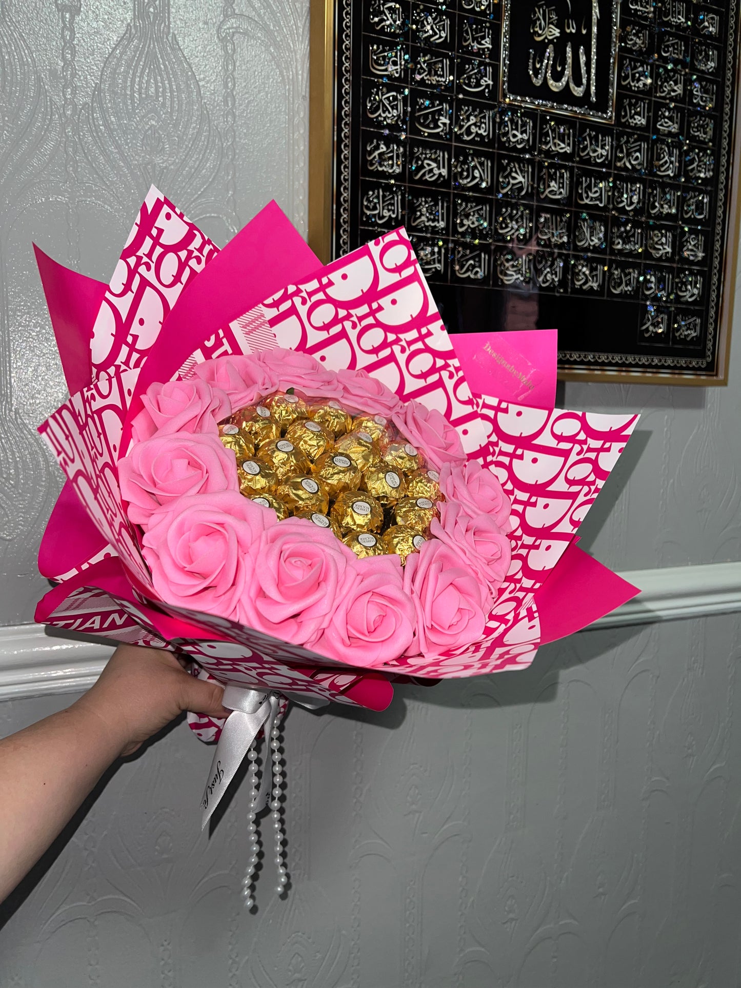 Ferrero & Rose bouquet wrapped with designer paper (artificial roses)