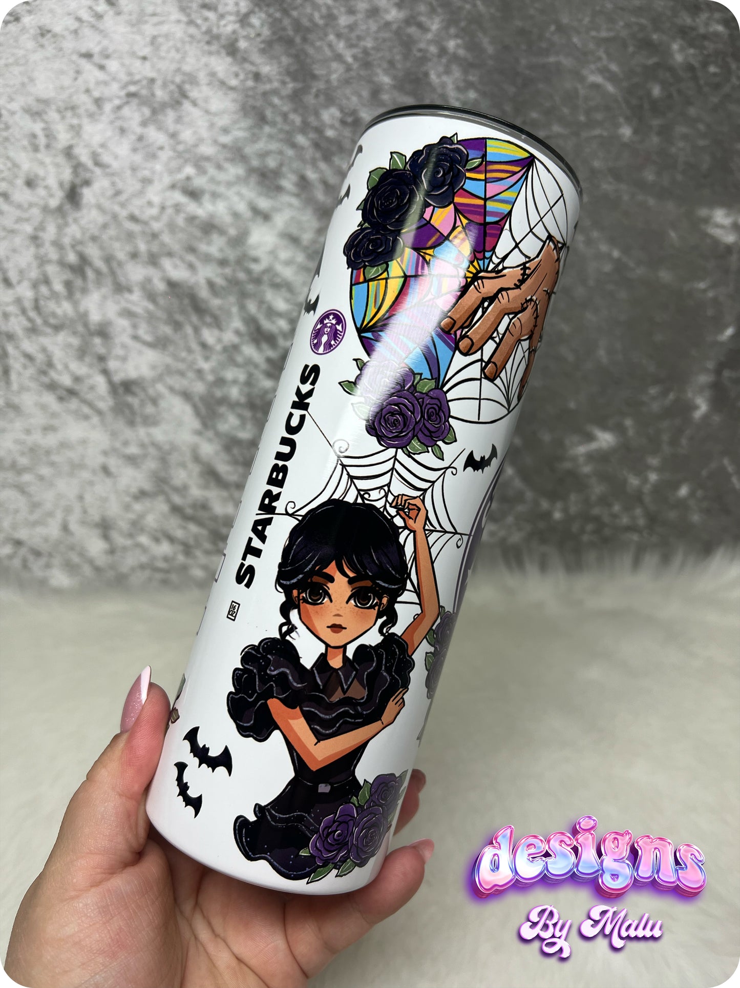 Personalised Wednesday Addams Starbucks Coffee Tumbler, featuring a gothic-style cartoon character with black braids, surrounded by purple roses and bats. This 20oz straight tumbler is beautifully designed with a ‘starbucks Coffee’ inspired logo and can be customised with any name. Perfect as a gift for her, this tumbler comes complete with a lid and straw, making it both stylish and functional for everyday use.