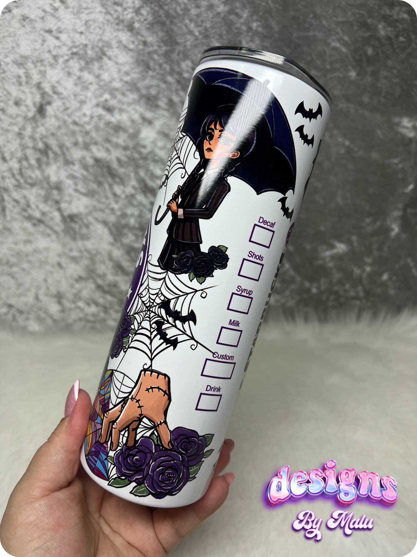 Personalised Wednesday Addams Starbucks Coffee Tumbler, featuring a gothic-style cartoon character with black braids, surrounded by purple roses and bats. This 20oz straight tumbler is beautifully designed with a ‘starbucks Coffee’ inspired logo and can be customised with any name. Perfect as a gift for her, this tumbler comes complete with a lid and straw, making it both stylish and functional for everyday use.